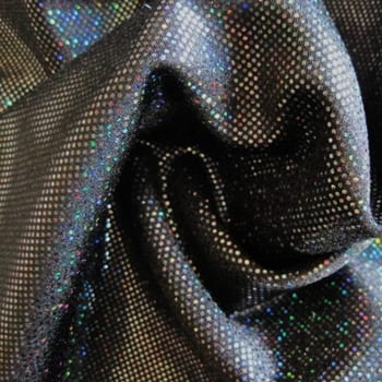 Black medium dot hologram spandex fabric featuring black stretch base fabric topped with black holographic foil, for brilliant shine and sparkle.