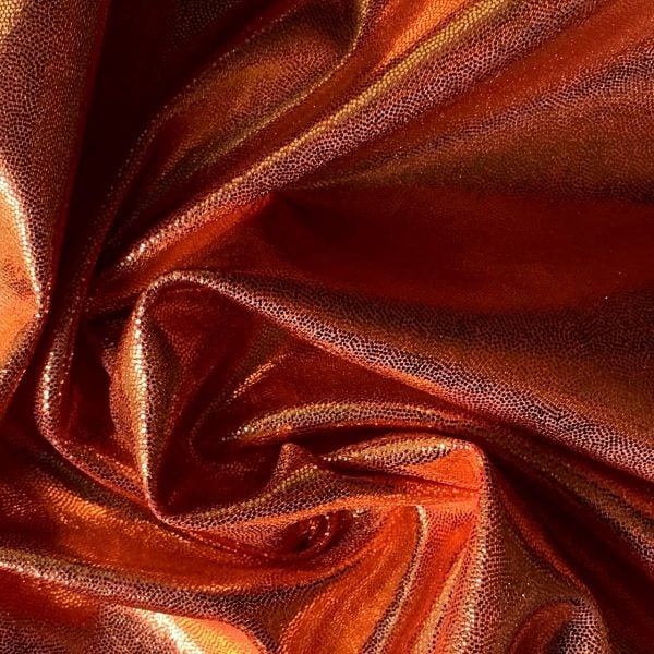 Orange Metallic Spandex Fabric is perfect for dance, cheer, bows, gymnastics, figure skating, costume, cosplay, apparel and more.