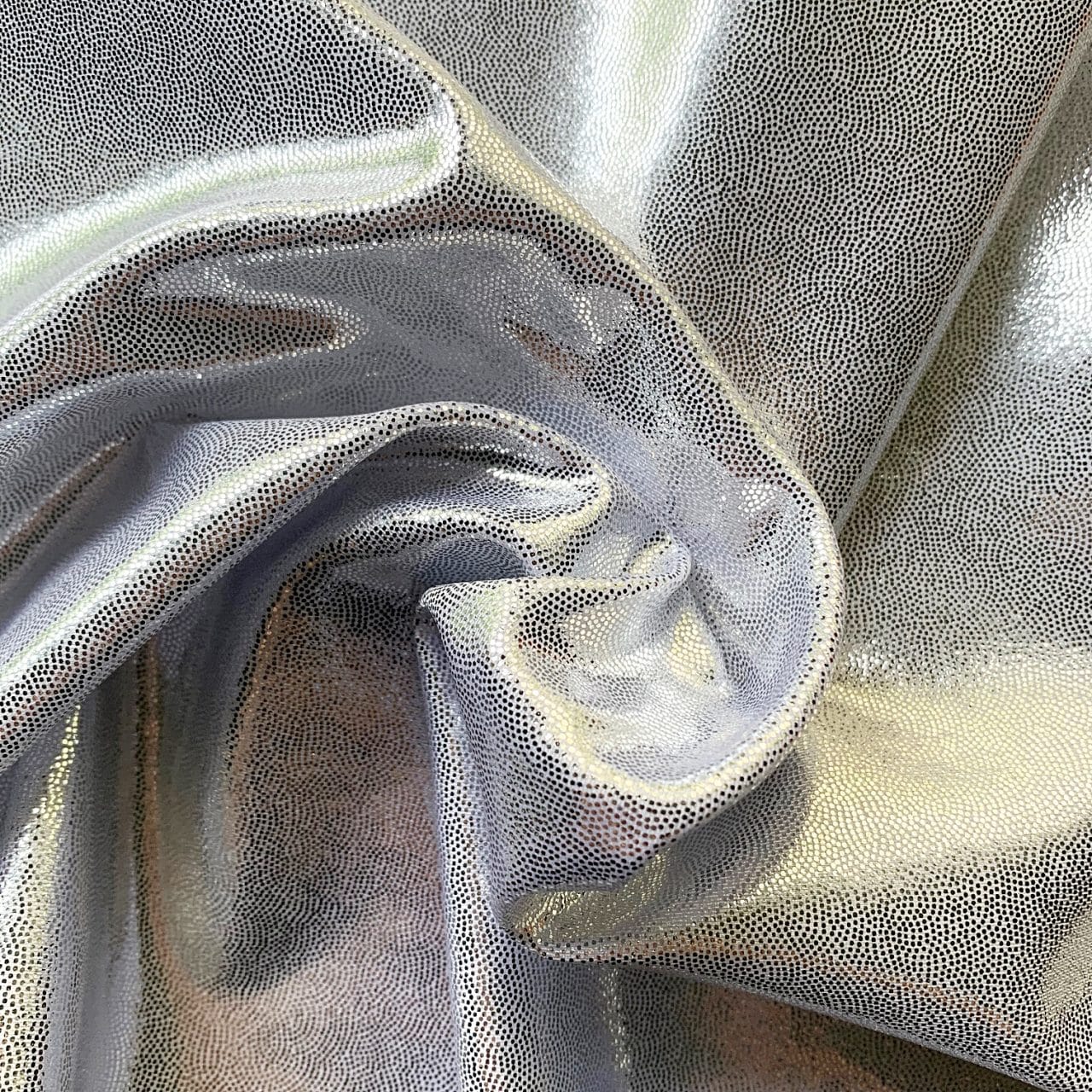 https://www.solidstonefabrics.com/wp-content/uploads/2018/06/Metallic-Sheen-Silver-White-Closeup-Solid-Stone-Fabrics-Inc.-Fabric-By-The-Yard.jpg