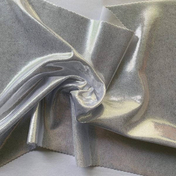 Silver Metallic Spandex Fabric is perfect for dance, cheer, bows, gymnastics, figure skating, costume, cosplay, apparel and more.