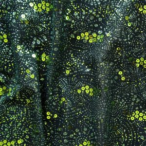 Sparkler Green Sequin Glitter Mesh Fabric features glitter and sequins on sheer stretch mesh base fabric for a glamorous look with lots of sparkle!