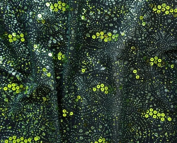 Sparkler Green Sequin Glitter Mesh Fabric features glitter and sequins on sheer stretch mesh base fabric for a glamorous look with lots of sparkle!
