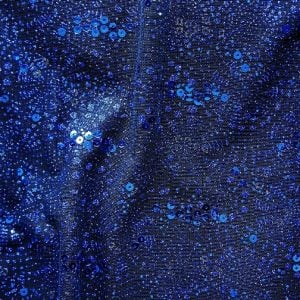 Sparkler Blue Sequin Glitter Mesh Fabric features glitter and sequins on sheer stretch mesh base fabric for a glamorous look with lots of sparkle!