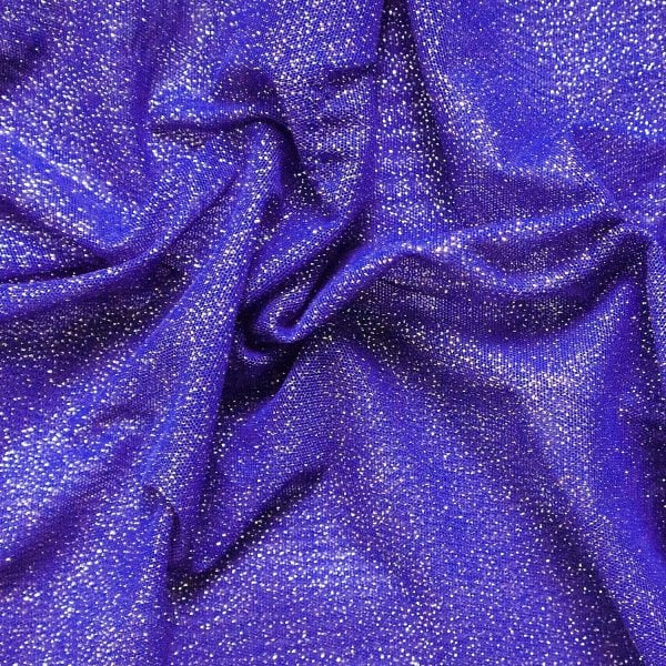Purple Glitter Mesh fabric features all over silver glitter on 2-way stretch purple polyester mesh making it ideal for both semi-fitted and draped garments.