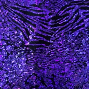 Purple animal print hologram fabric featuring black stretch base fabric topped with purple shattered glass holographic foil in multiple animal prints for brilliant shine and sparkle.