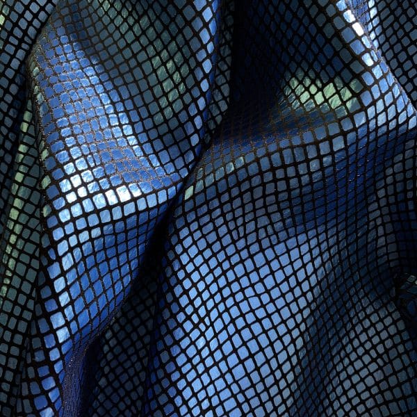 Python - Matte Royal Blue/Black blue snakeskin stretch velvet fabric features plush black 4-way stretch velvet topped with sleek, matte royal blue snakeskin foil for an ultra-sleek, modern look. 