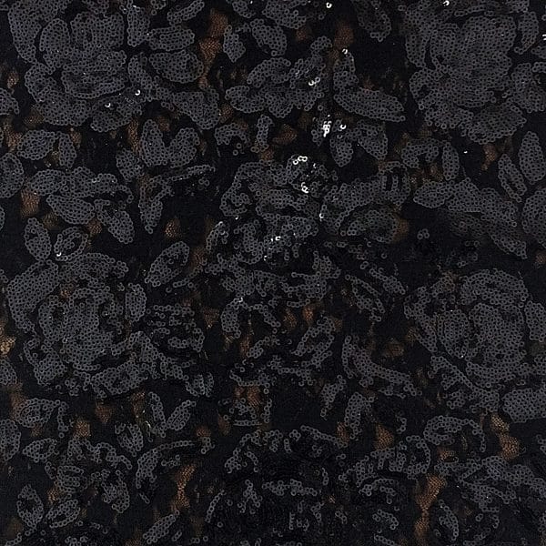 Black embroidered floral sequin fabric features stretch base fabric (Nylon/Spandex 88/12) with embroidered sequin flowers for an elegant, glamorous look.